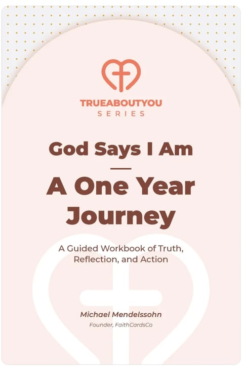 Book cover of God Says I Am: A One Year Journey by Michael Mendelssohn, a guided workbook with heart and cross symbol design